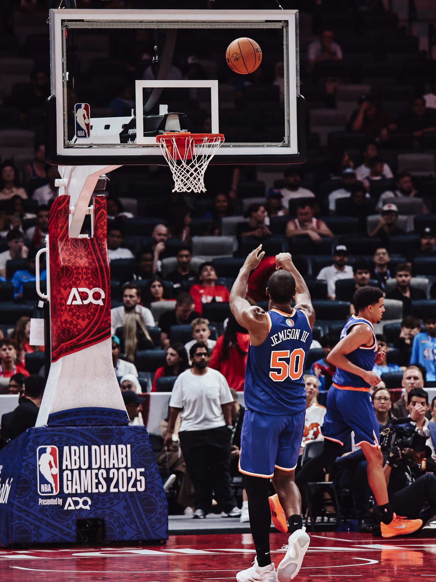 New York No. 50 shooting a free throw beneath an Abu Dhabi Games 2025 basket